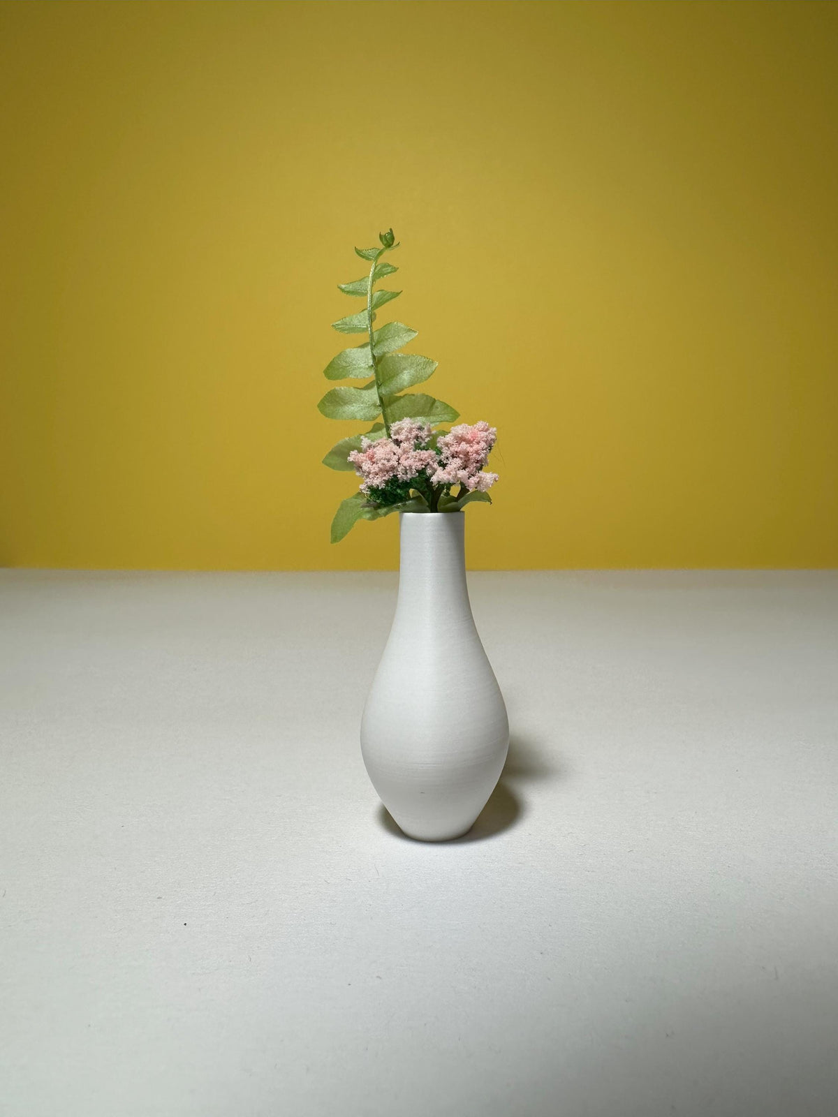 round miniature vases viewed from the front